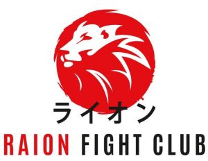 Logo klubu sportowego Raion, głowa lwa na czeronym kole